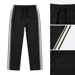 MannerCo grass green color-block drawstring jogger pants with contrast tape side stripe, product display
