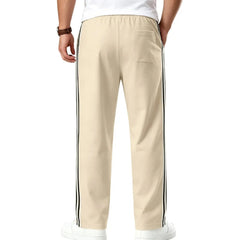 MannerCo khaki color-block drawstring jogger pants product display with contrast tape side stripe
