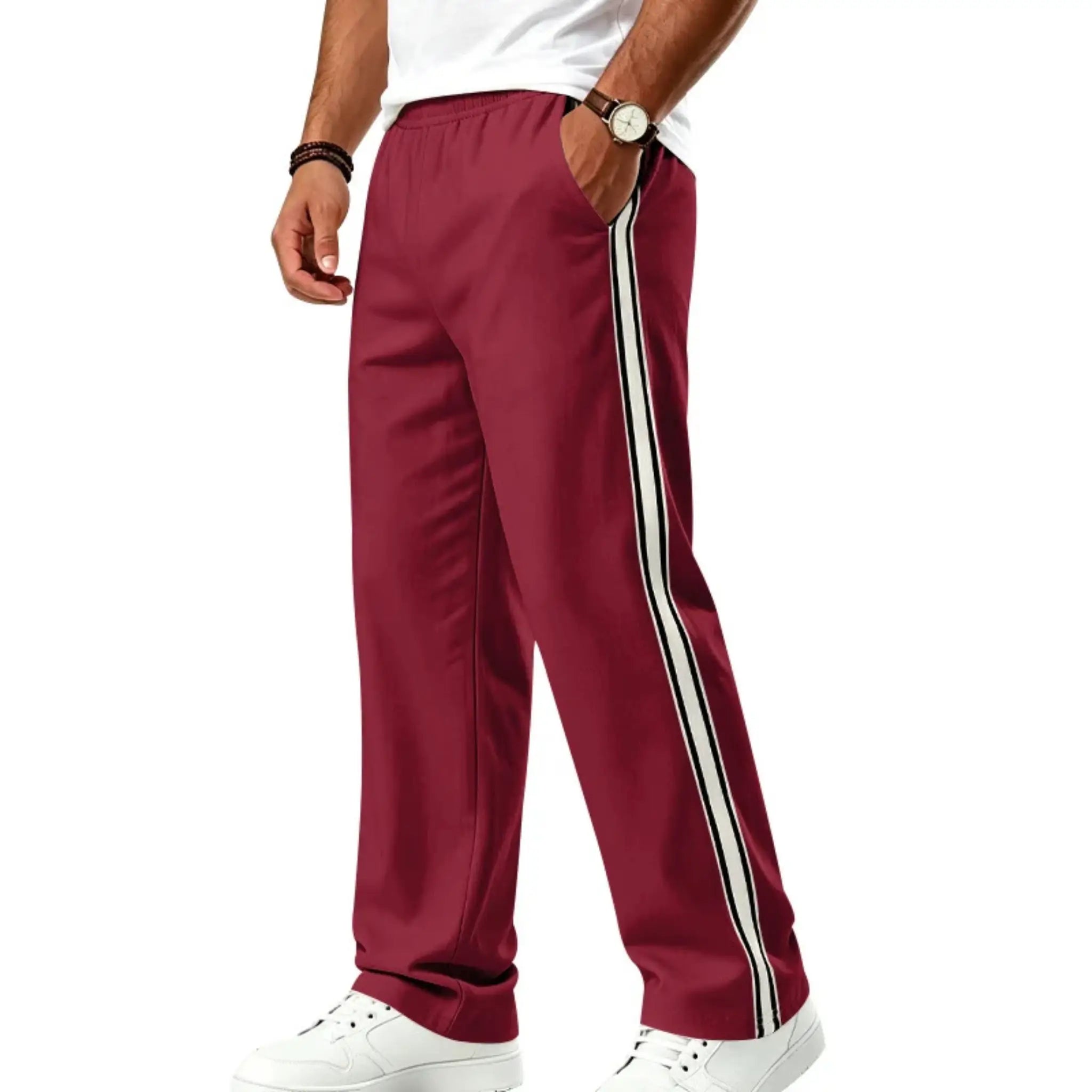 Man wearing MannerCo wine red color-block jogger pants with contrast tape detail, back view