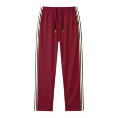 MannerCo wine red color-block drawstring jogger pants product display with contrast tape detail