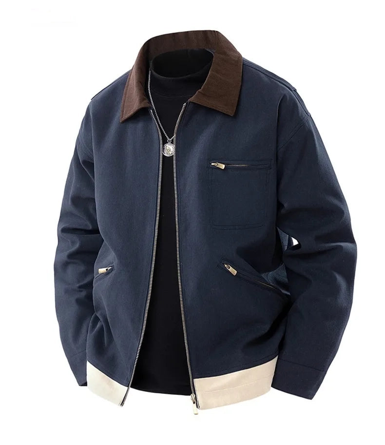 Man wearing MannerCo blue contrast lapel workwear jacket with turn-down collar, front view
