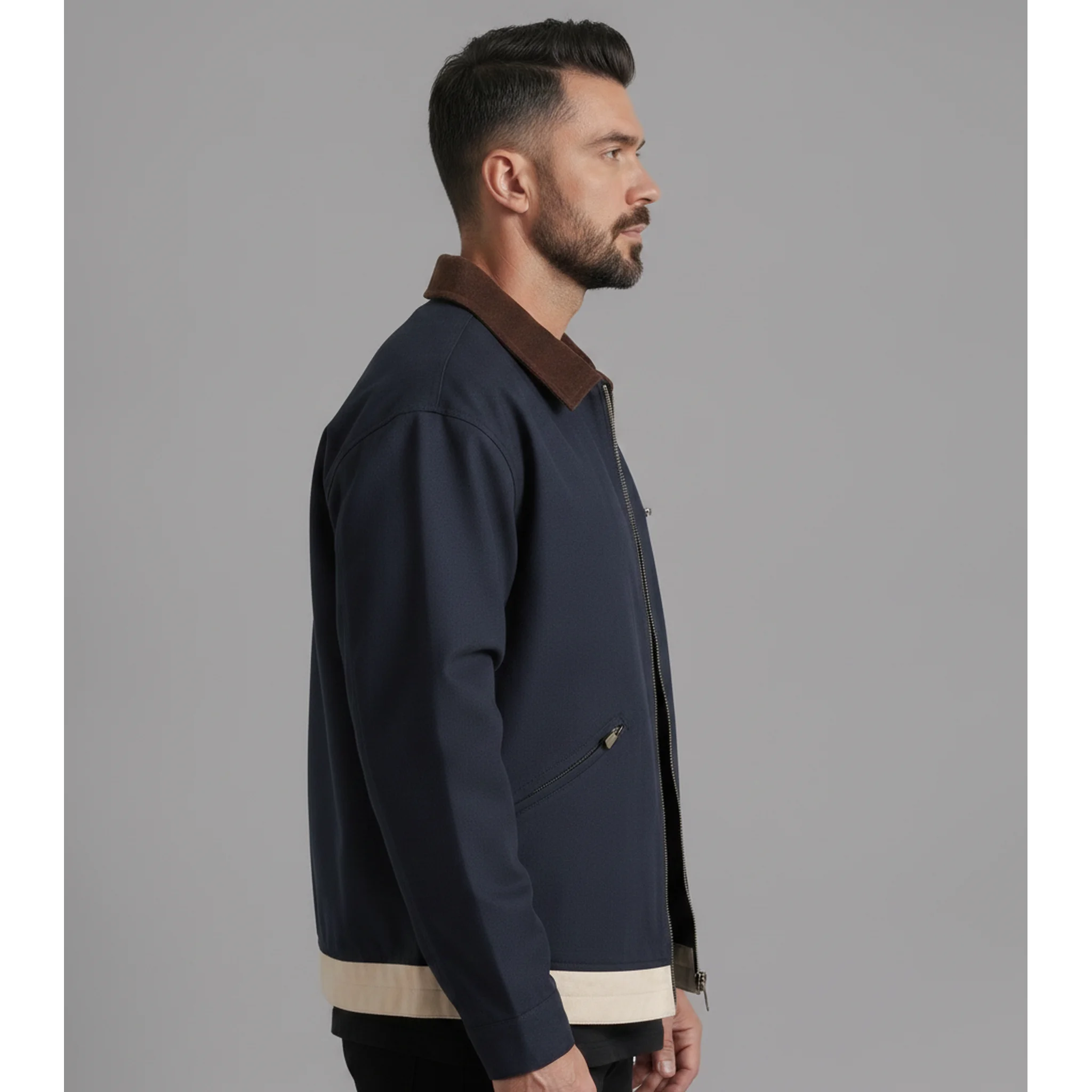 Man wearing MannerCo blue contrast lapel workwear jacket, side view on plain background