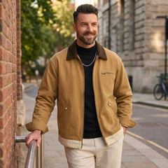 Man wearing MannerCo light green contrast lapel workwear jacket in outdoor lifestyle setting