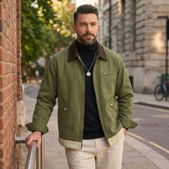 Man wearing MannerCo olive green contrast lapel workwear jacket in outdoor lifestyle setting