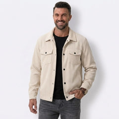 Man wearing MannerCo apricot corduroy single-breasted lapel jacket, front view on plain background