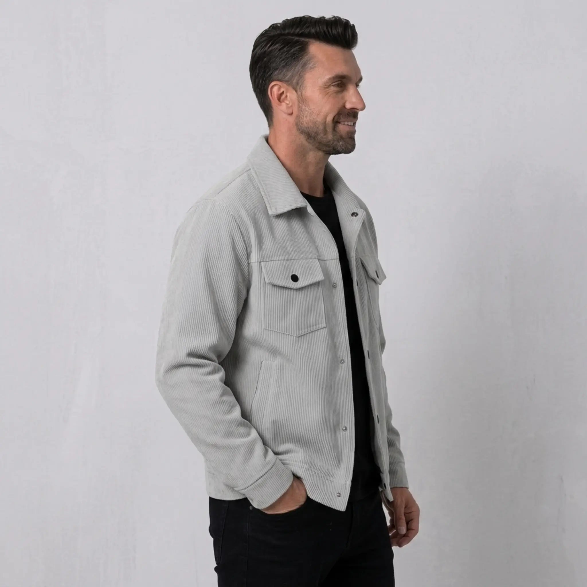 Man wearing MannerCo light gray corduroy single-breasted lapel jacket, front view on plain background