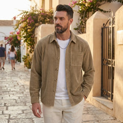 Man wearing MannerCo khaki corduroy long sleeve shirt in outdoor lifestyle setting