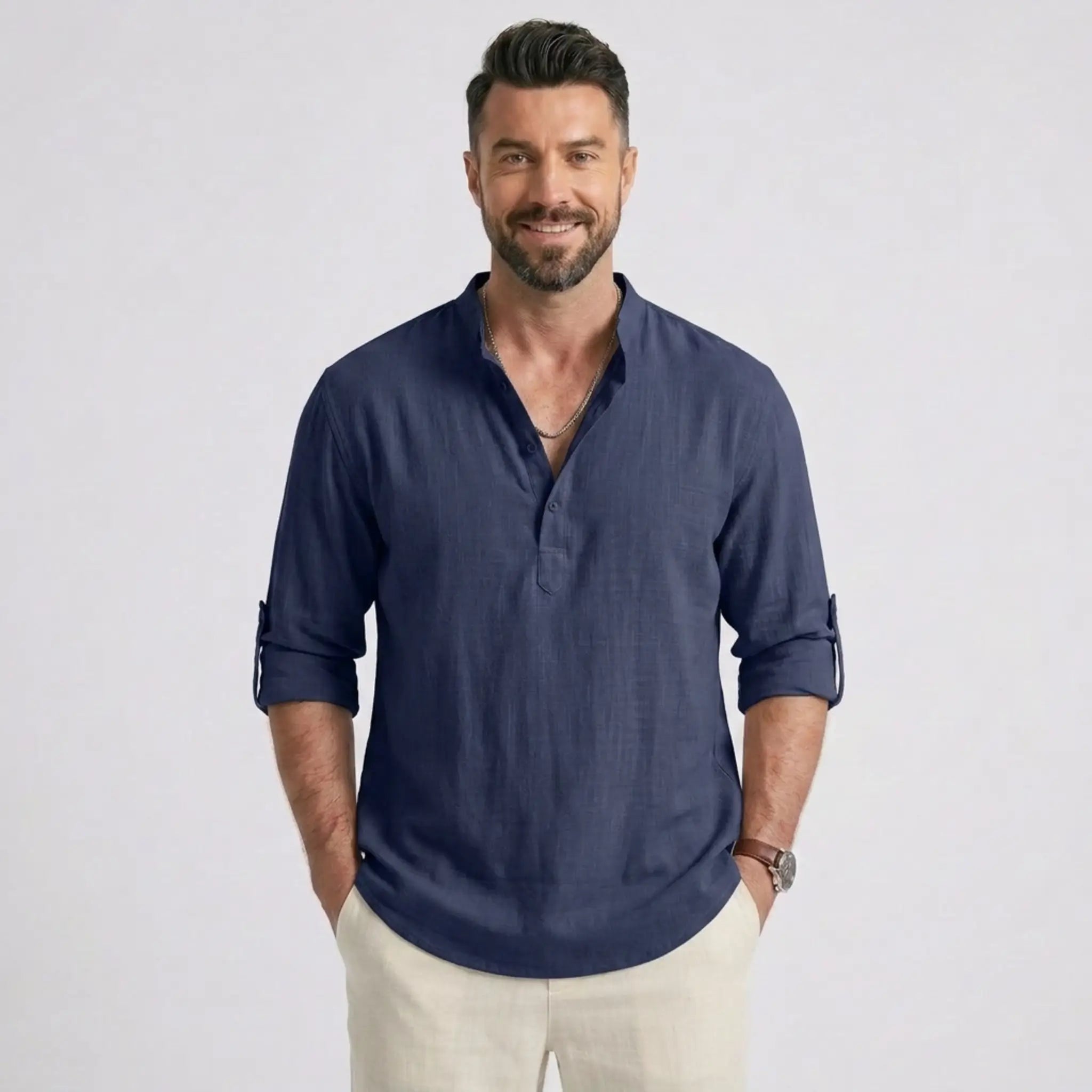 Man wearing MannerCo navy cotton linen long sleeve Henley shirt with stand collar, front view