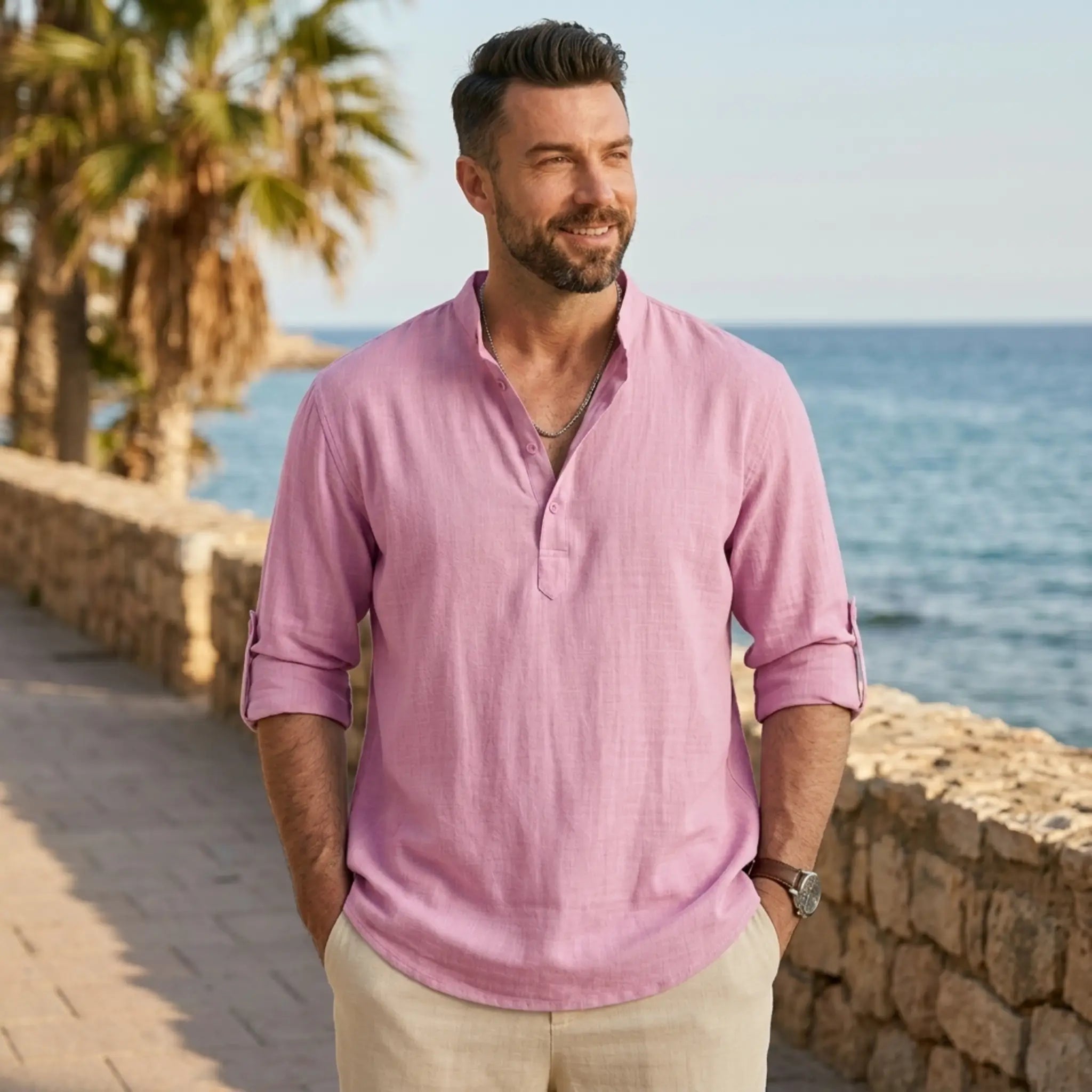 Man wearing MannerCo white cotton linen long sleeve Henley shirt, back view on plain background