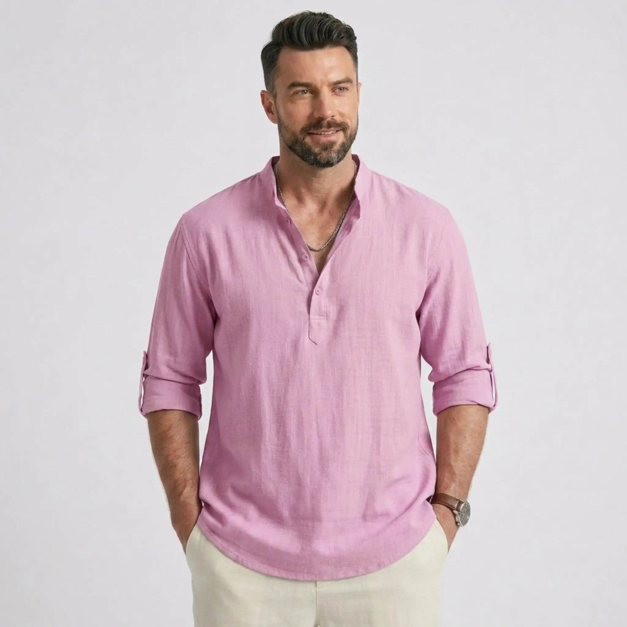 Man wearing MannerCo white cotton linen long sleeve Henley shirt with stand collar, front view