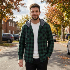 MannerCo dark green plaid hooded shirt jacket worn outdoors in autumn street setting