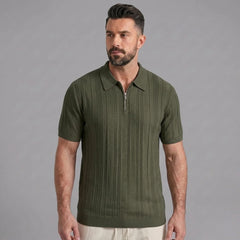 Man wearing a dark green stripe jacquard knit zip-up polo shirt front view on plain background