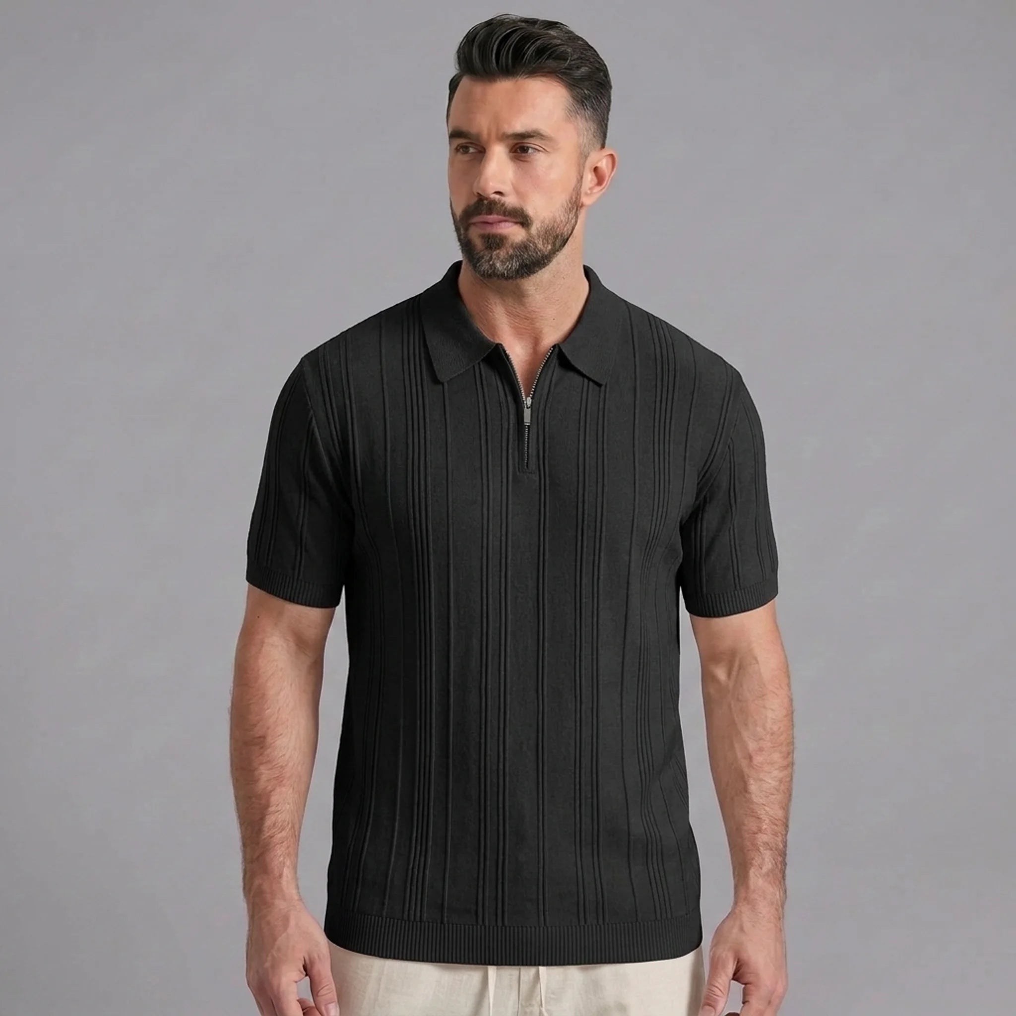 Man in dark green stripe jacquard knit zip-up polo shirt in sunny outdoor scene