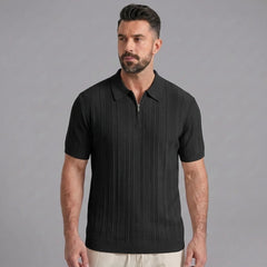 Man in dark green stripe jacquard knit zip-up polo shirt in sunny outdoor scene