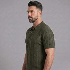 Side view of man in dark green stripe jacquard knit zip-up polo shirt