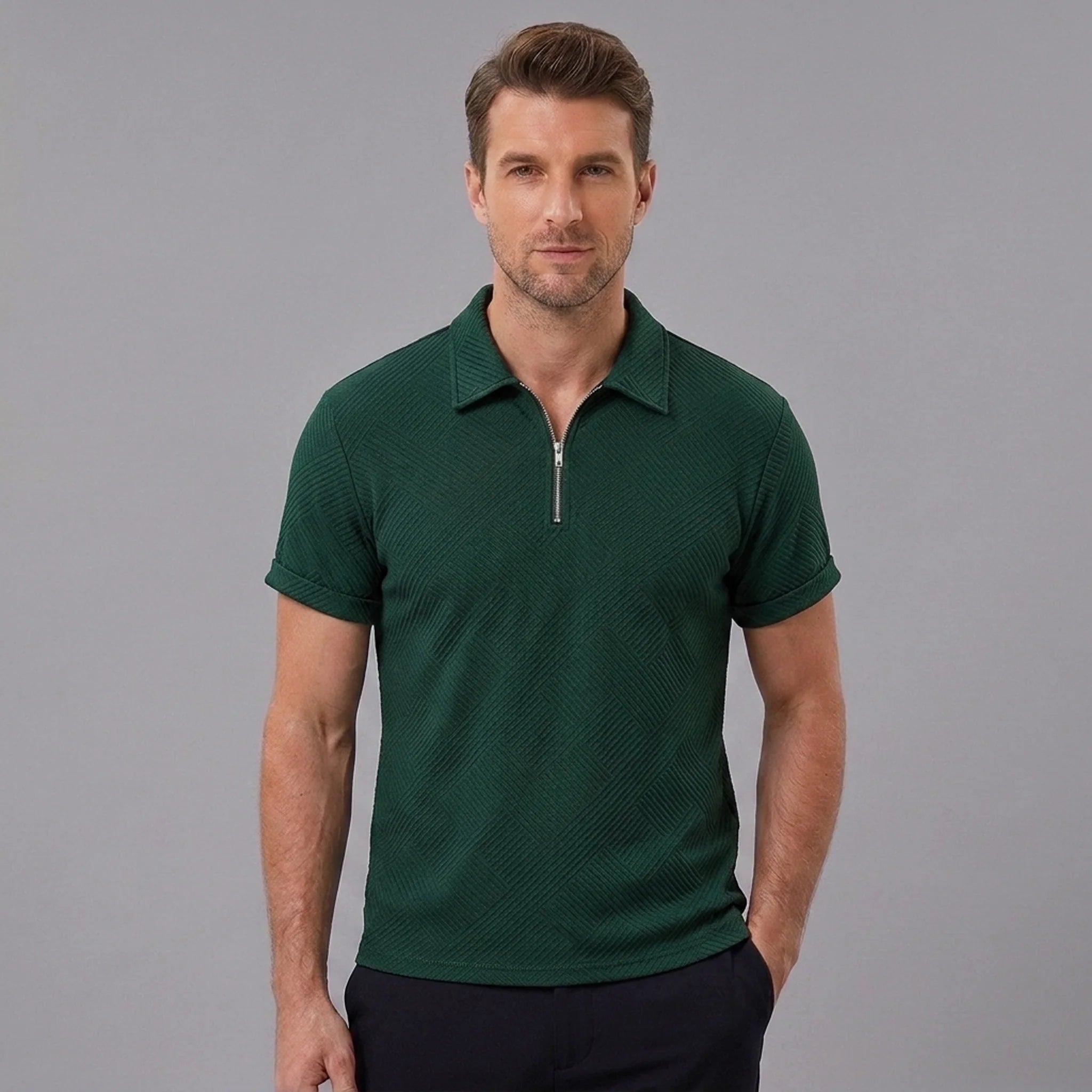 Man wearing a dark green stripe jacquard zip-up polo shirt front view on plain background
