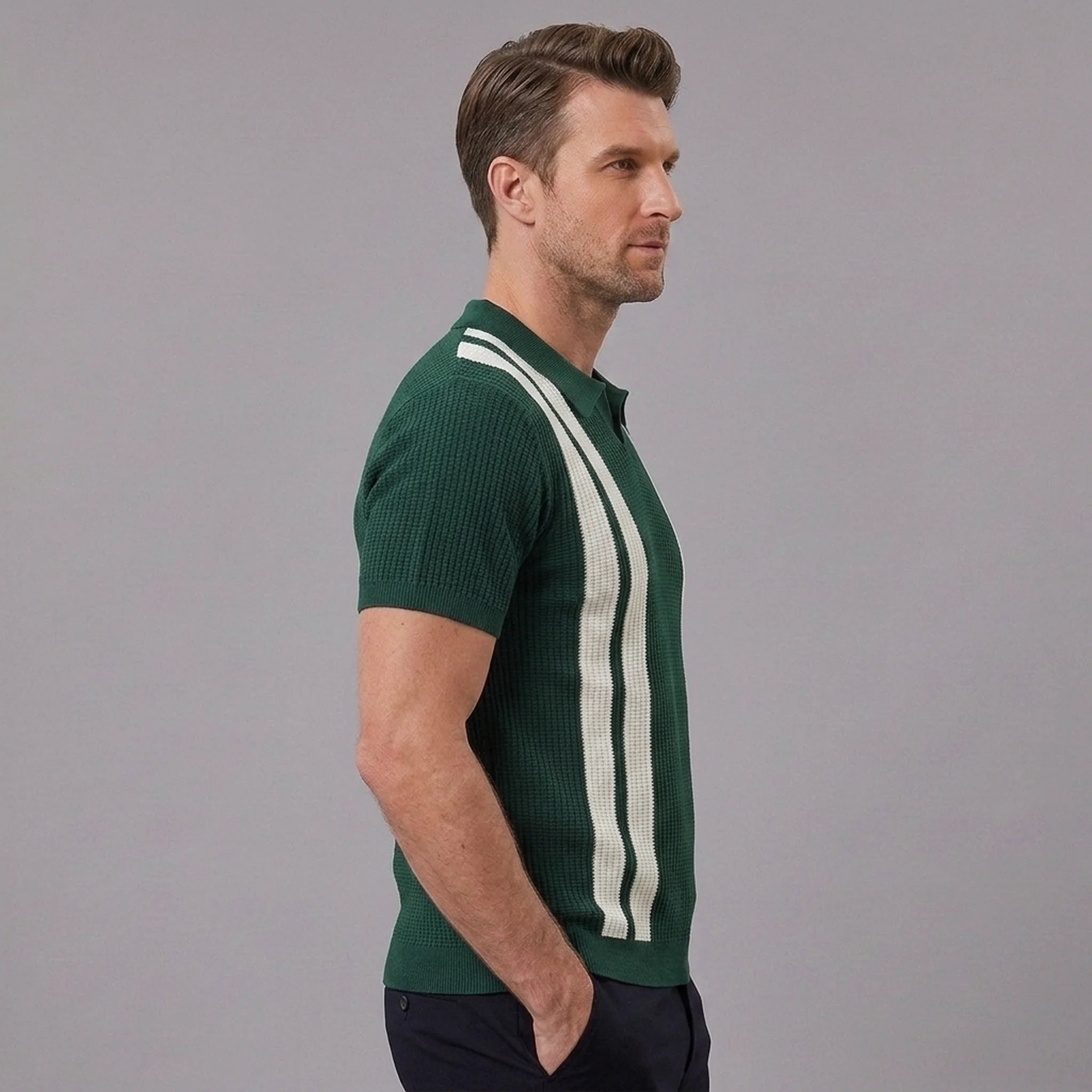 Man wearing dark green striped knit polo shirt in outdoor lifestyle setting