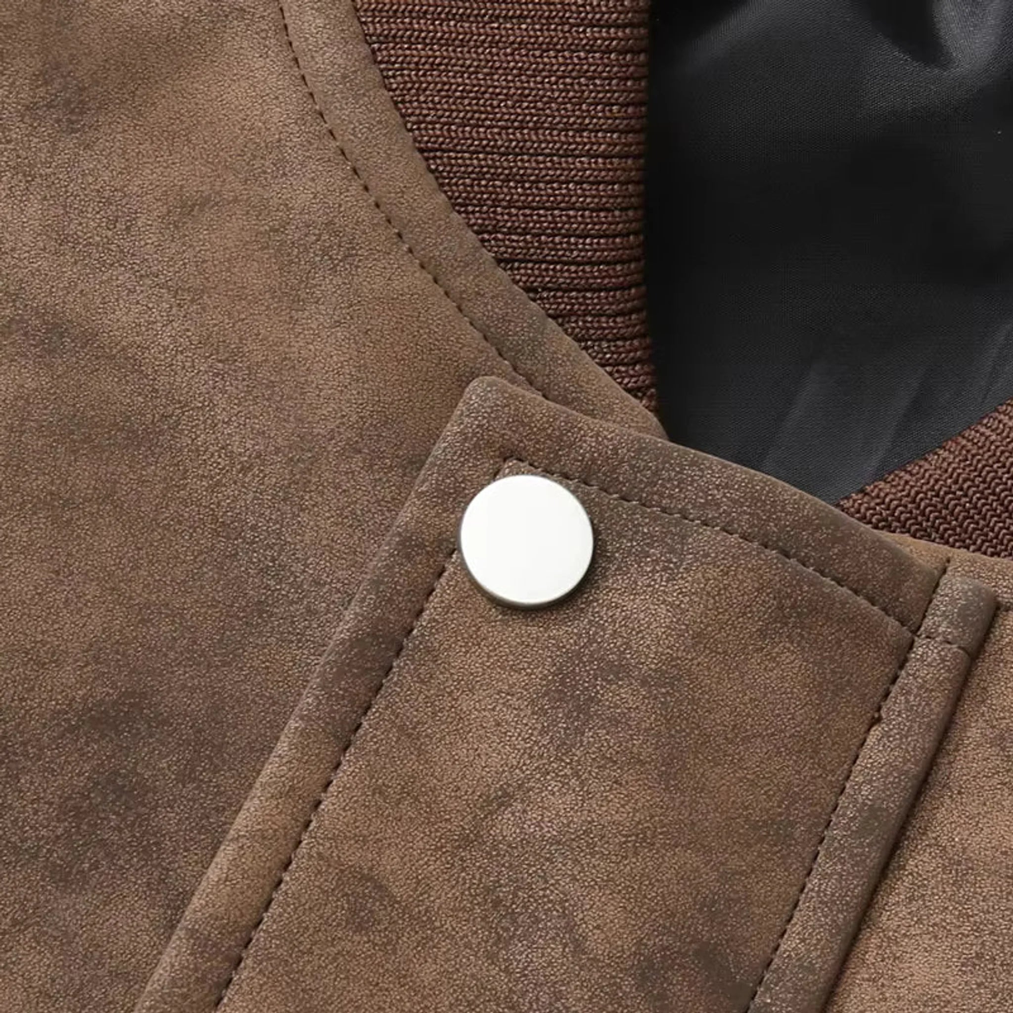 MannerCo coffee faux suede jacket close-up showing silver snap button and stitching detail