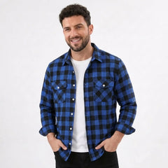 MannerCo blue plaid flannel shirt with turn-down collar and dual chest pockets worn open over white tee