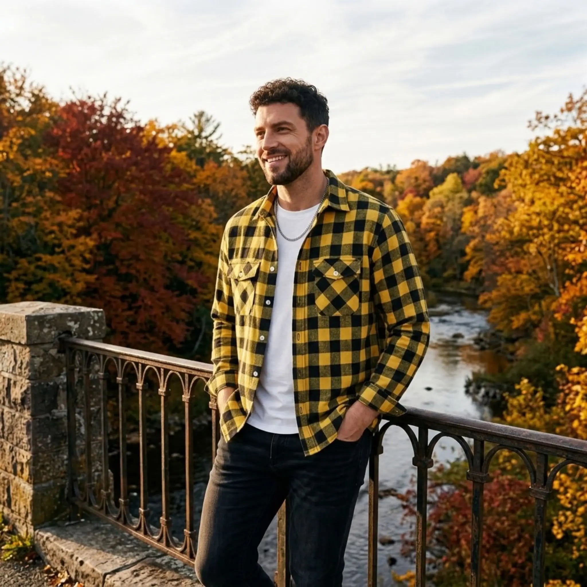 MannerCo yellow plaid flannel shirt with turn-down collar worn outdoors on bridge in autumn setting