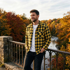 MannerCo yellow plaid flannel shirt with turn-down collar worn outdoors on bridge in autumn setting