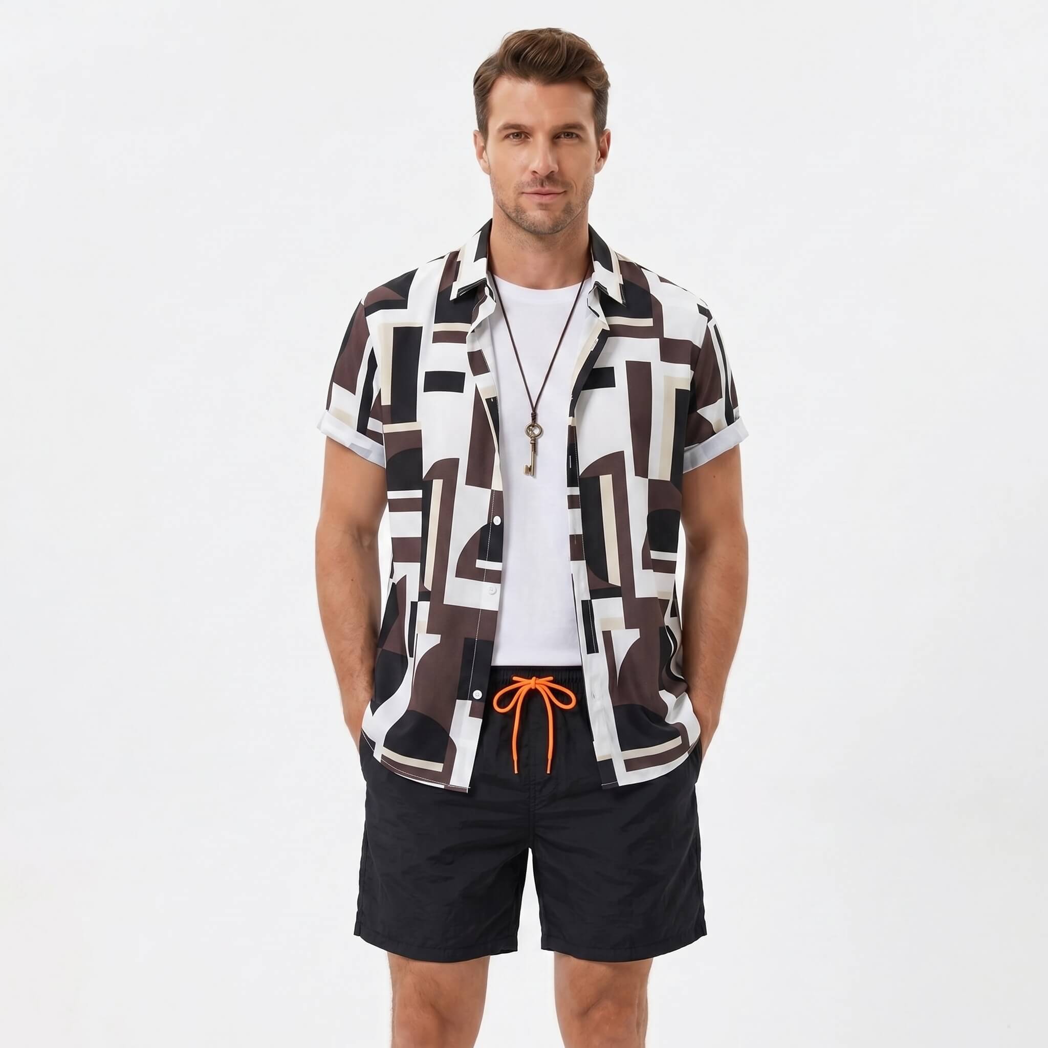 Man wearing a geometry colorblock print button up shirt and swim shorts front view on plain background