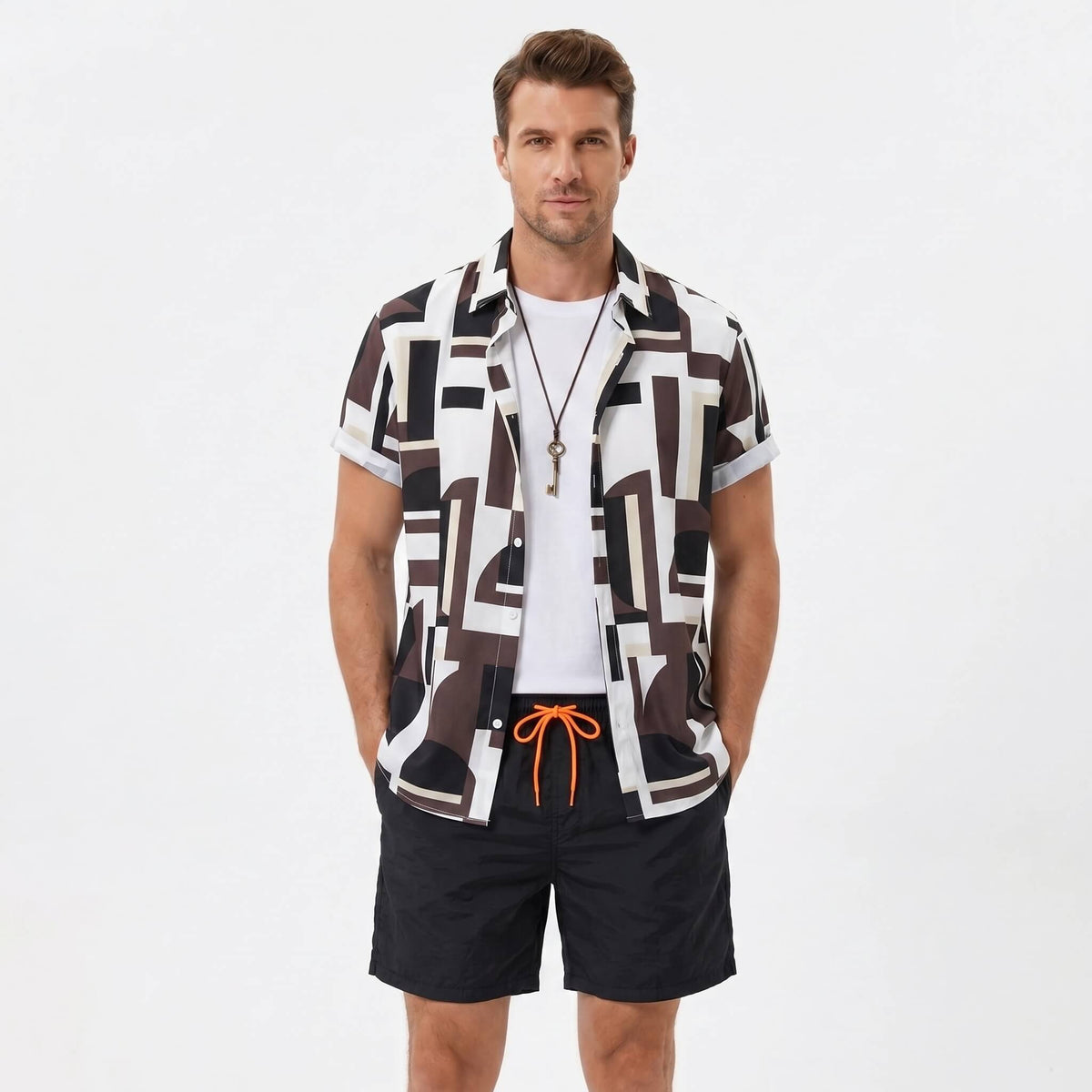 Man wearing a geometry colorblock print button up shirt and swim shorts front view on plain background