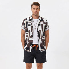 Man wearing a geometry colorblock print button up shirt and swim shorts front view on plain background
