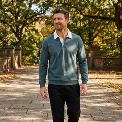 MannerCo green polo collar hoodie loose fit worn outdoors in autumn park setting