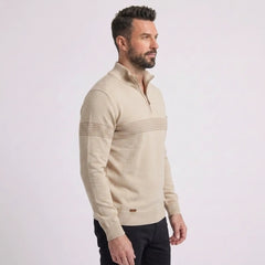 Man wearing MannerCo apricot slim fit half-zip sweater, side view on plain background