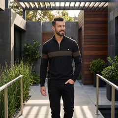 Man wearing MannerCo black half-zip cotton sweater slim fit in outdoor lifestyle setting