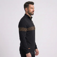 Man wearing MannerCo black slim fit half-zip sweater with stripe detail, side view