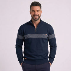 Man wearing MannerCo navy half-zip sweater with chest stripe detail, slim fit, front view