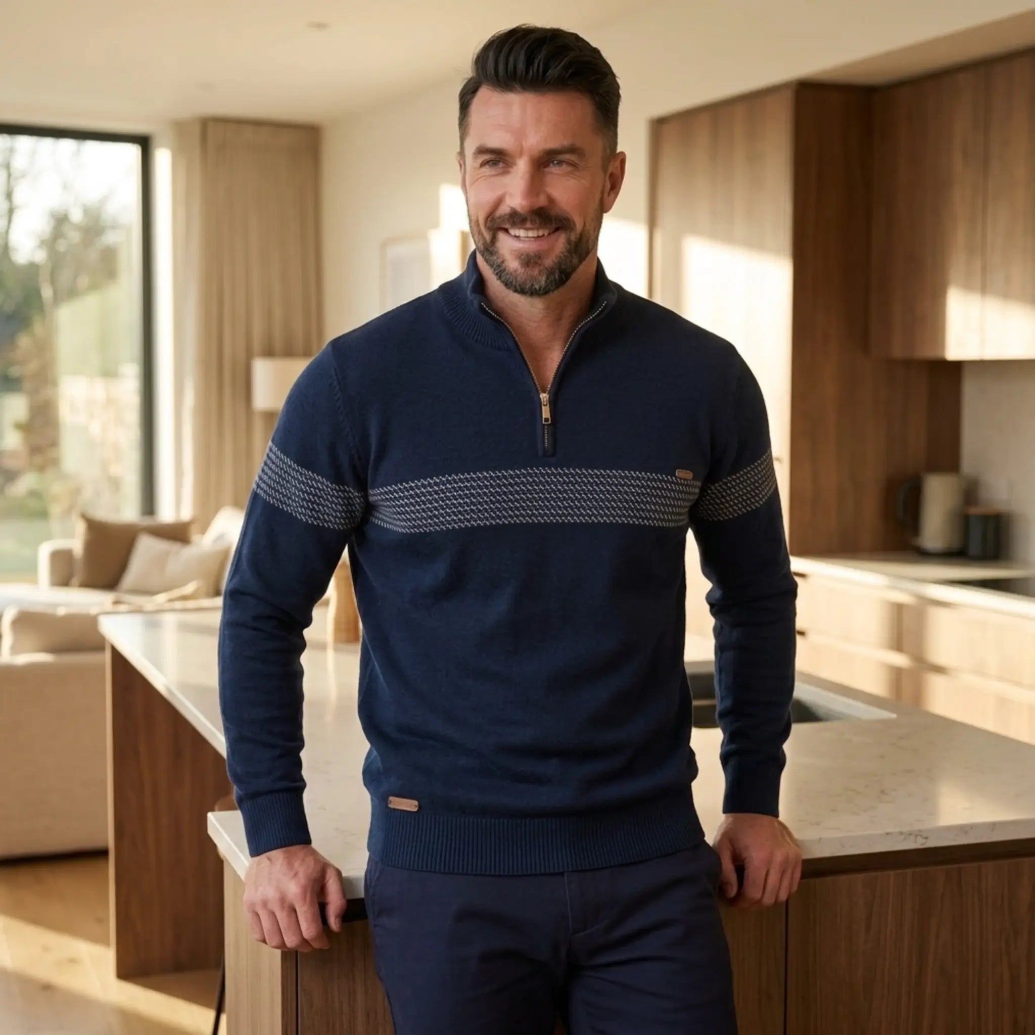 Man wearing MannerCo navy half-zip sweater slim fit in indoor lifestyle setting