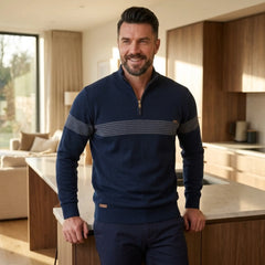 Man wearing MannerCo navy half-zip sweater slim fit in indoor lifestyle setting