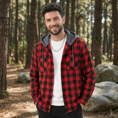 MannerCo red buffalo plaid hooded flannel jacket worn by man in forest setting