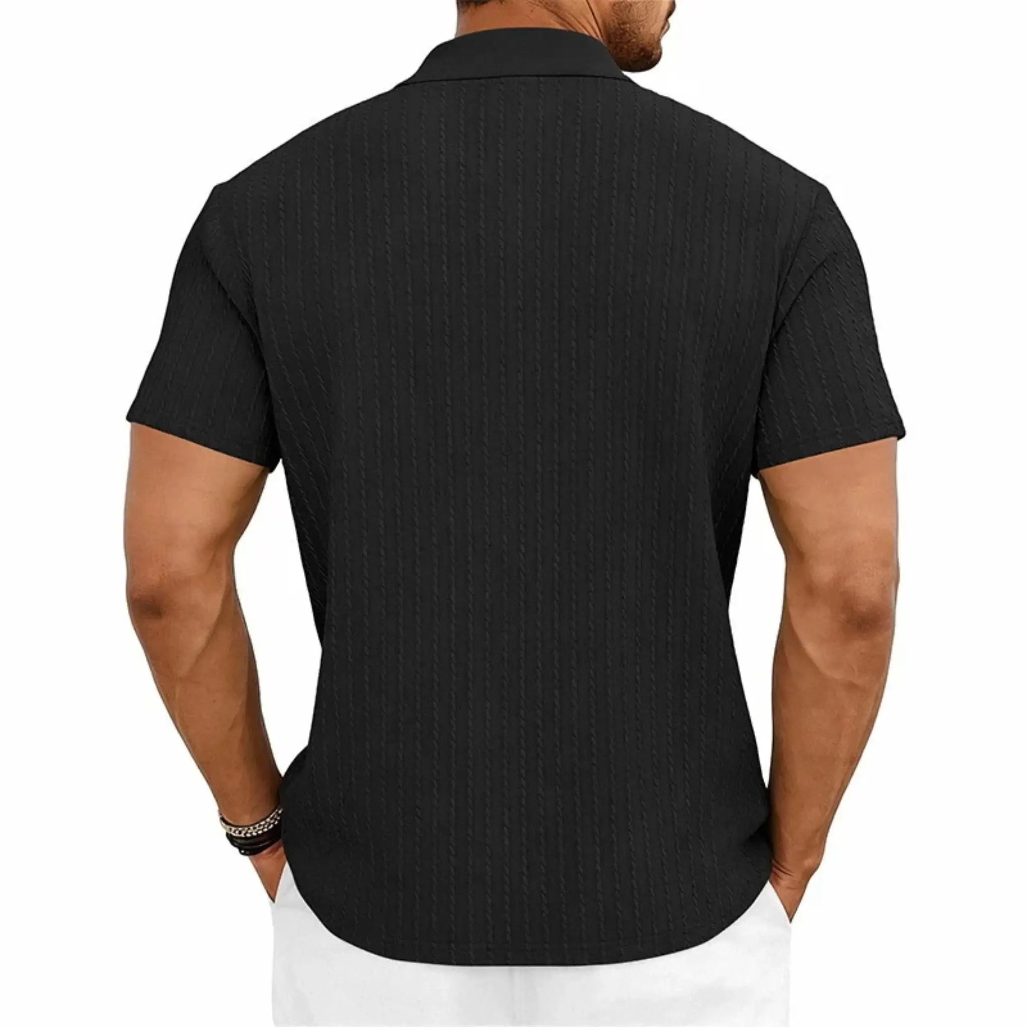 MannerCo black jacquard knit polo shirt back view with subtle texture and classic collar