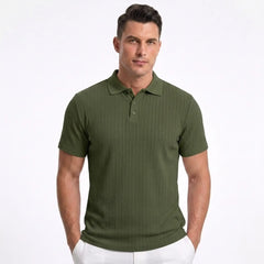 Man wearing MannerCo khaki jacquard knit polo shirt with button placket and classic collar, front view
