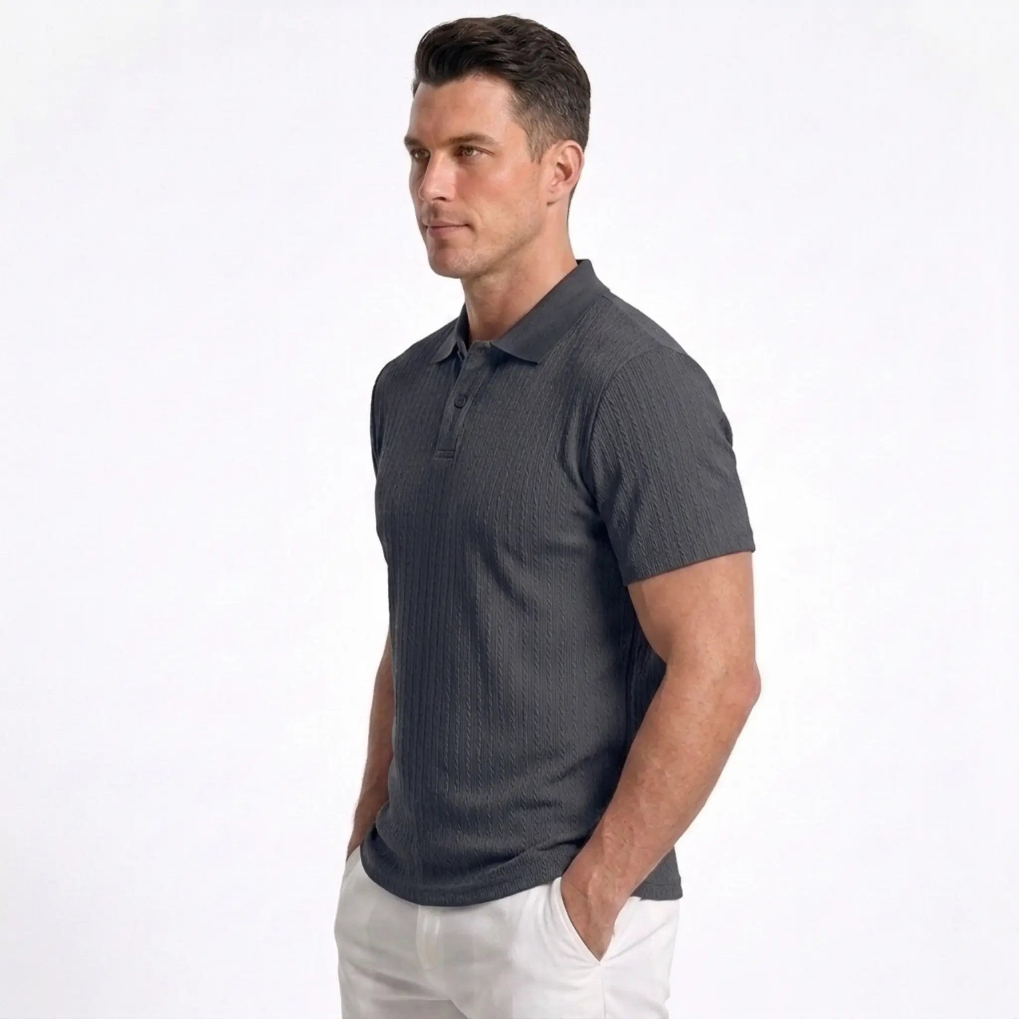 Man wearing MannerCo navy blue jacquard knit polo shirt in outdoor lifestyle setting