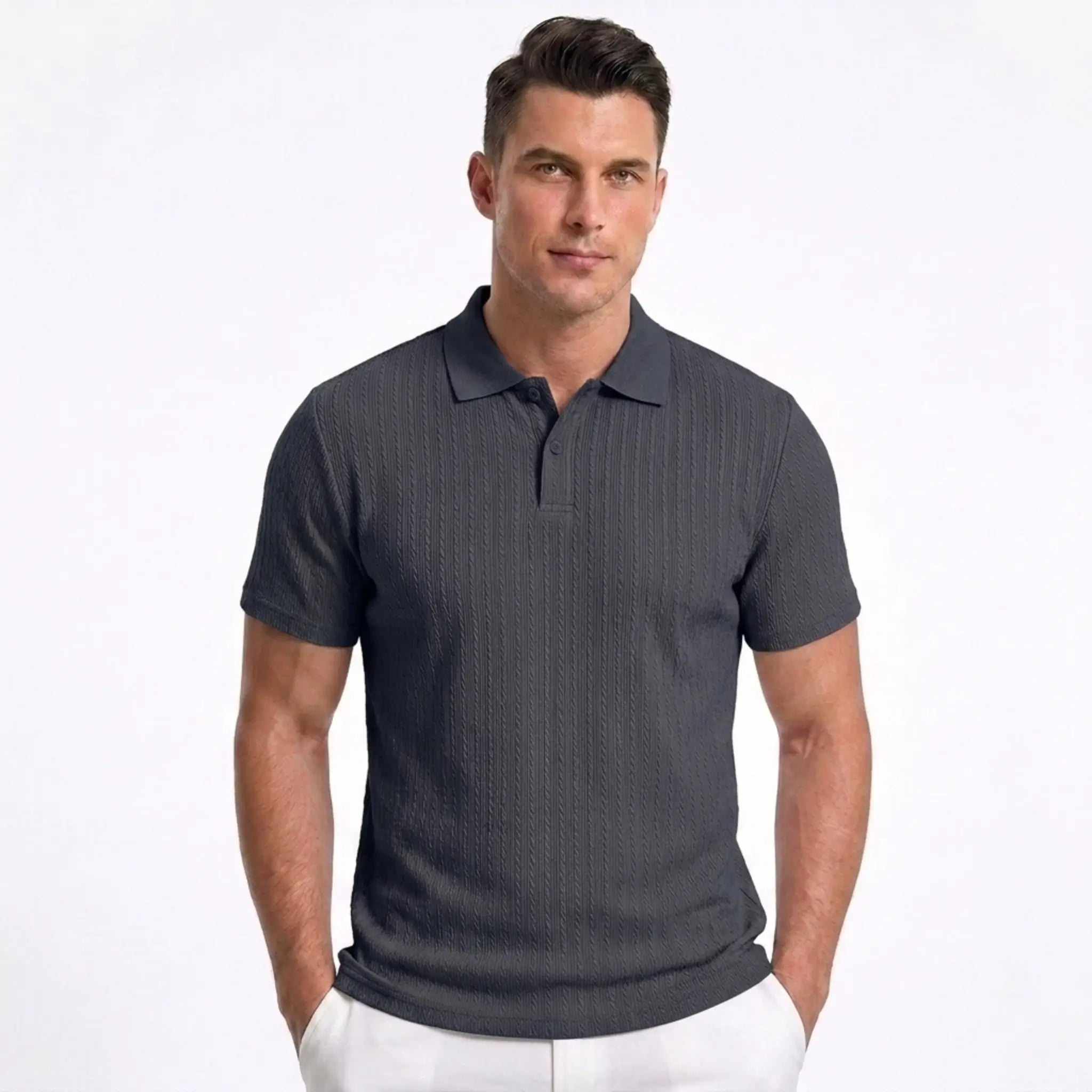 Man wearing MannerCo navy blue jacquard knit polo shirt in outdoor lifestyle setting