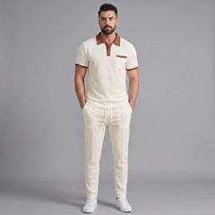 Side view of man in khaki color block waffle polo and straight leg pants on plain background