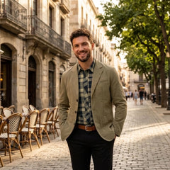 MannerCo khaki washed cotton casual blazer jacket worn outdoors on cobblestone street