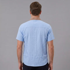 MannerCo light blue linen blend short sleeve shirt with contrast collar, back view on male model