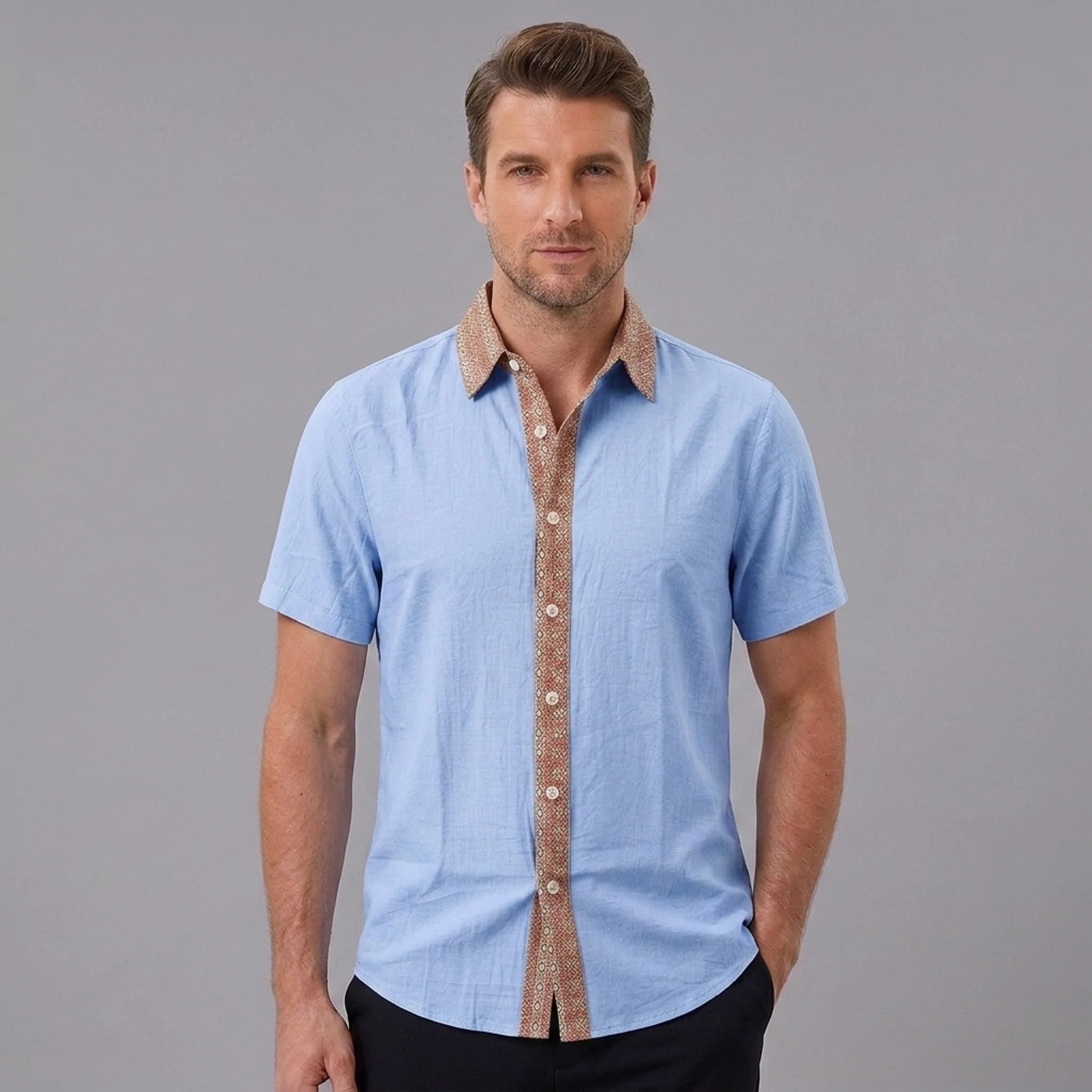 MannerCo light blue linen blend short sleeve shirt with contrast brown patterned collar and button placket, front view