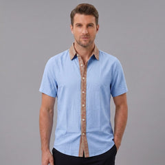 MannerCo light blue linen blend short sleeve shirt with contrast brown patterned collar and button placket, front view