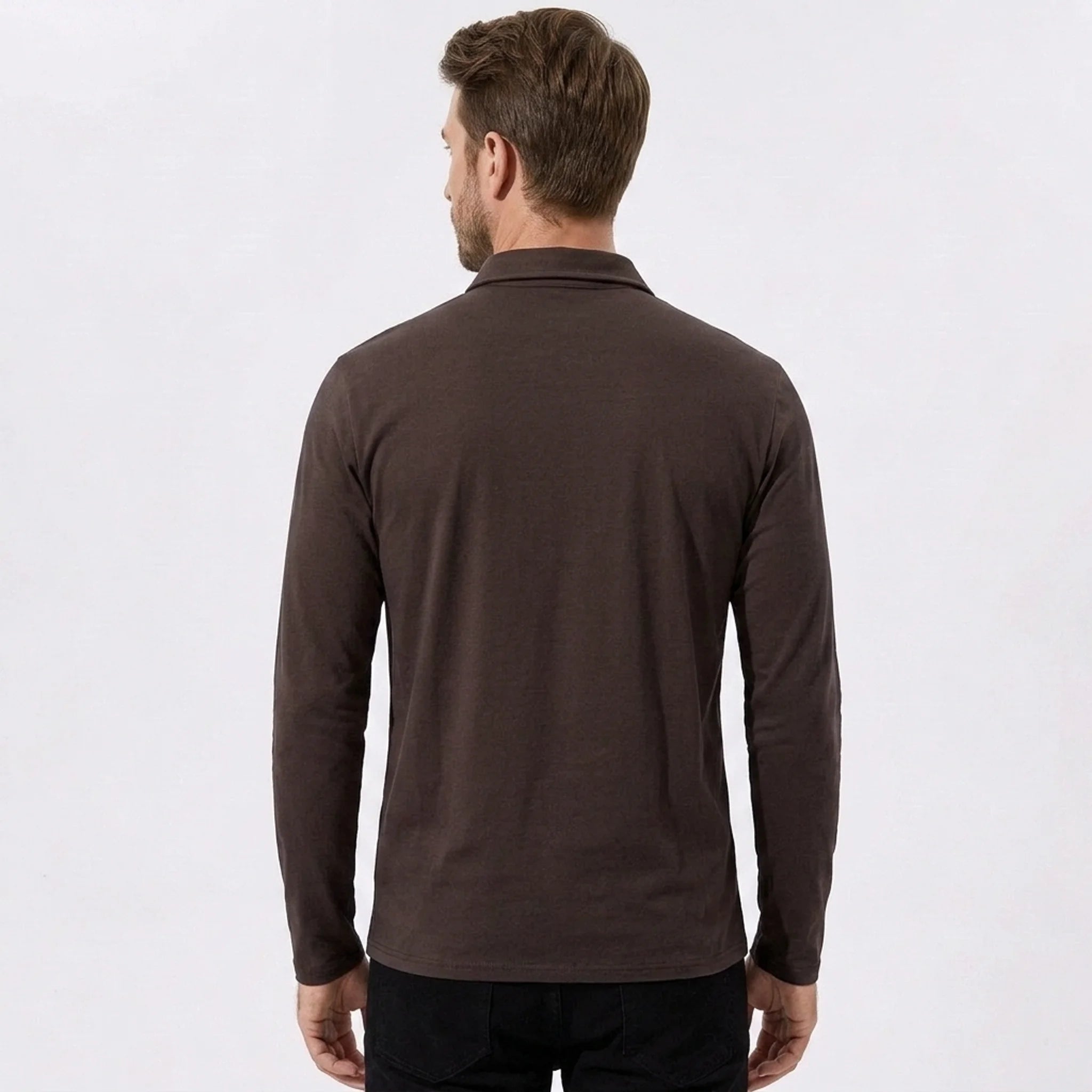 Side view of man in maroon solid long sleeve cotton polo shirt