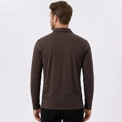 Side view of man in maroon solid long sleeve cotton polo shirt