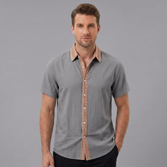 MannerCo men's medium gray linen blend short sleeve shirt with terracotta contrast collar and button placket, front view