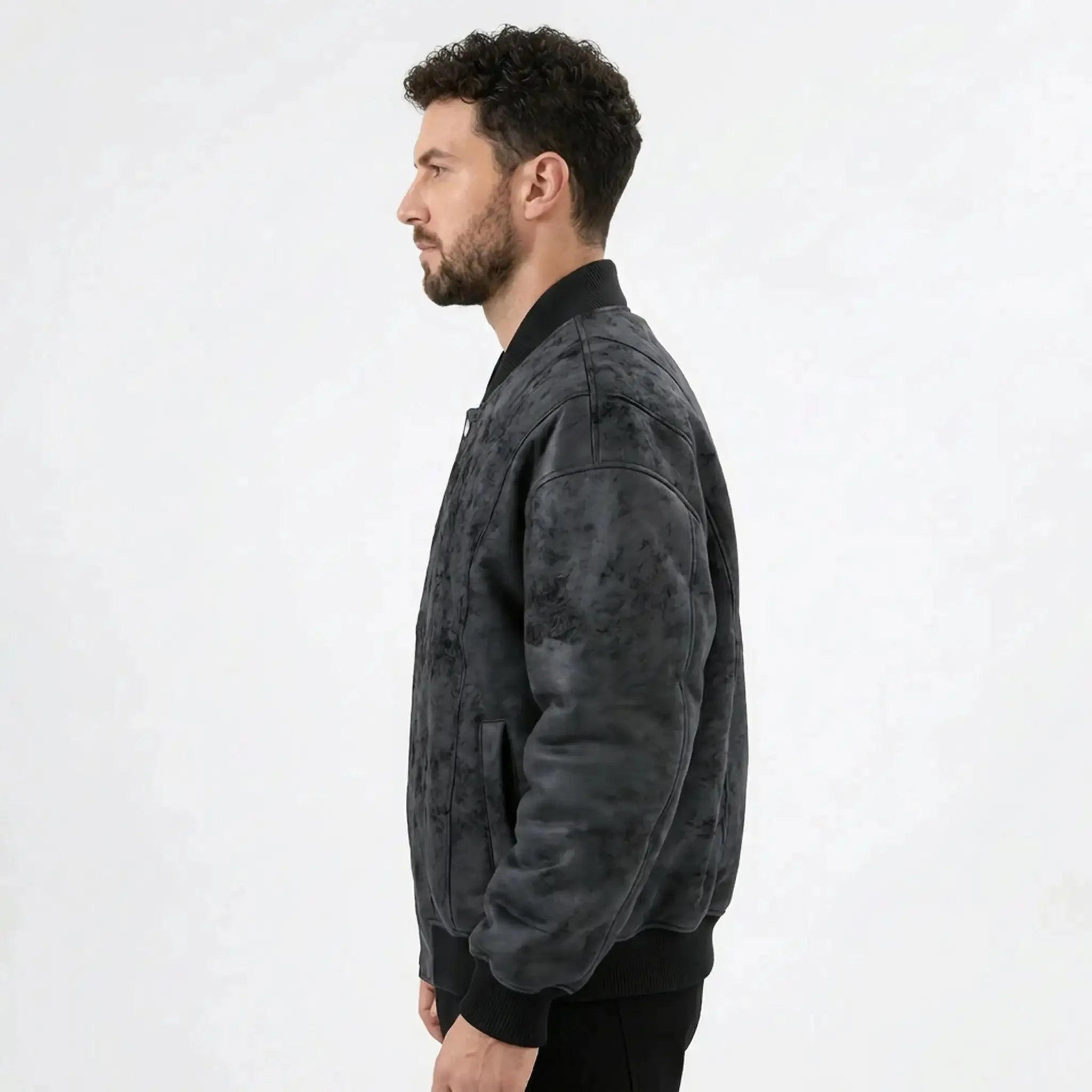 MannerCo men's black faux suede bomber jacket side view with ribbed collar and cuffs