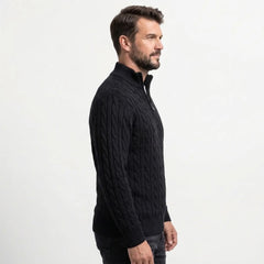 Black cable knit quarter-zip sweater on model, side view